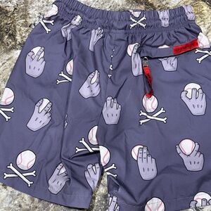 Gray and red baseballism shorts.